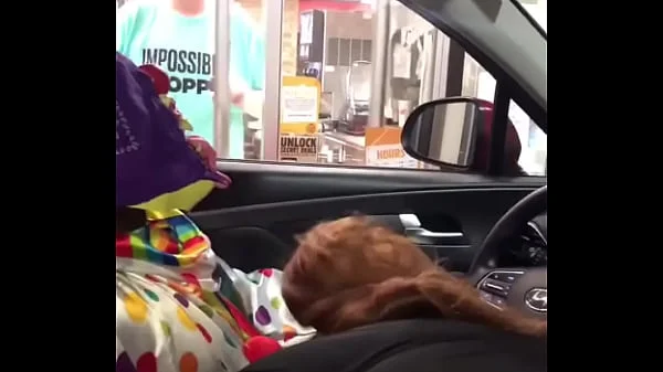 Clown gets dick sucked while ordering food