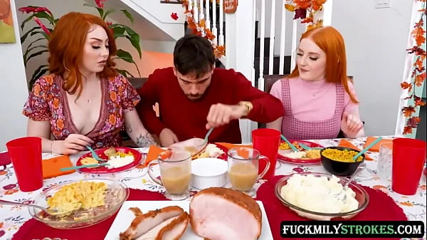 This Thanksgiving horny redhead stepsisters Arietta Adams and Cherry Fae fuck their stepbrother in the living room, while their stepdad fucks their stepmom in the dining room.