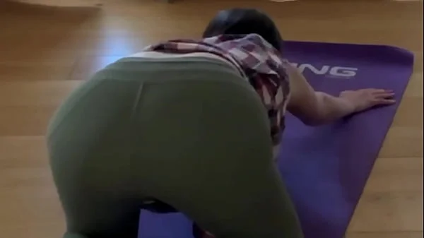 Milky Step Mother was caught by her horny Stepson while she showing her ass on yoga lesson