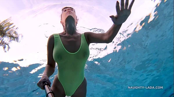 My transparent when wet one piece swimwear in public pool