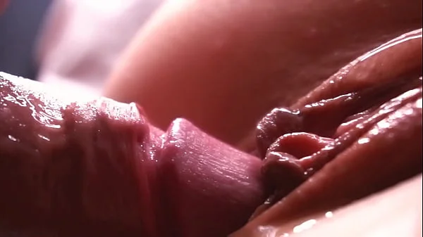 SLOW MOTION. Extremely close-up. Sperm dripping down the pussy