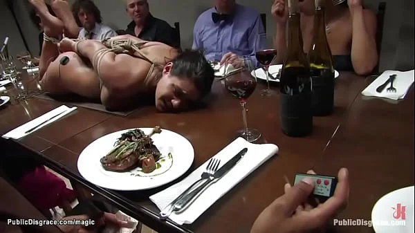 Bound slave laid on dinning table